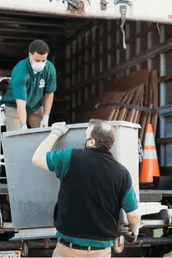 Ridly employees carrying rubbish in truck kc1cmn b27b5d0d62