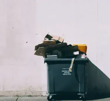 rubbish bin full of rubbish
